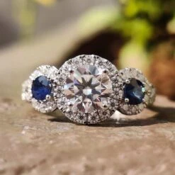2.13 TCW Round Cut With Blue Sapphire Three Stones Engagement Ring