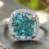 5.57 TCW Cushion Brilliant Cut Cyan Blue Moissanite Halo Pave Wedding Ring