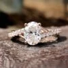 Contemporary Twisted 8.50 MM Oval Cut Moissanite Engagement Ring