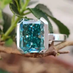 Half Bezel 4.39 CT Cyan Blue Radiant Cut Moissanite Engagement Ring