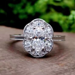 1.48 TCW Oval Cut Moissanite With Marquise Cluster Halo Engagement Ring