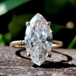 3.92 TCW Marquise Moissanite Twisted Hidden Halo Engagement Ring
