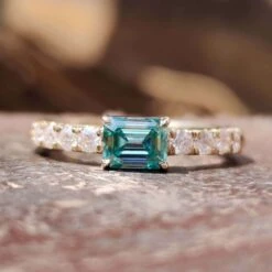 0.82 TCW East To West Cyan Blue Emerald Moissanite Pave Set Engagement Ring