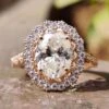 2.29 TW Oval Cut Twisted Outline Cathedral Set Moissanite Halo Engagement Ring