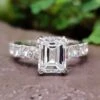 3.48 TW Emerald And Round Cut Double Claw Prongs Hidden Halo Moissanite Engagement Ring